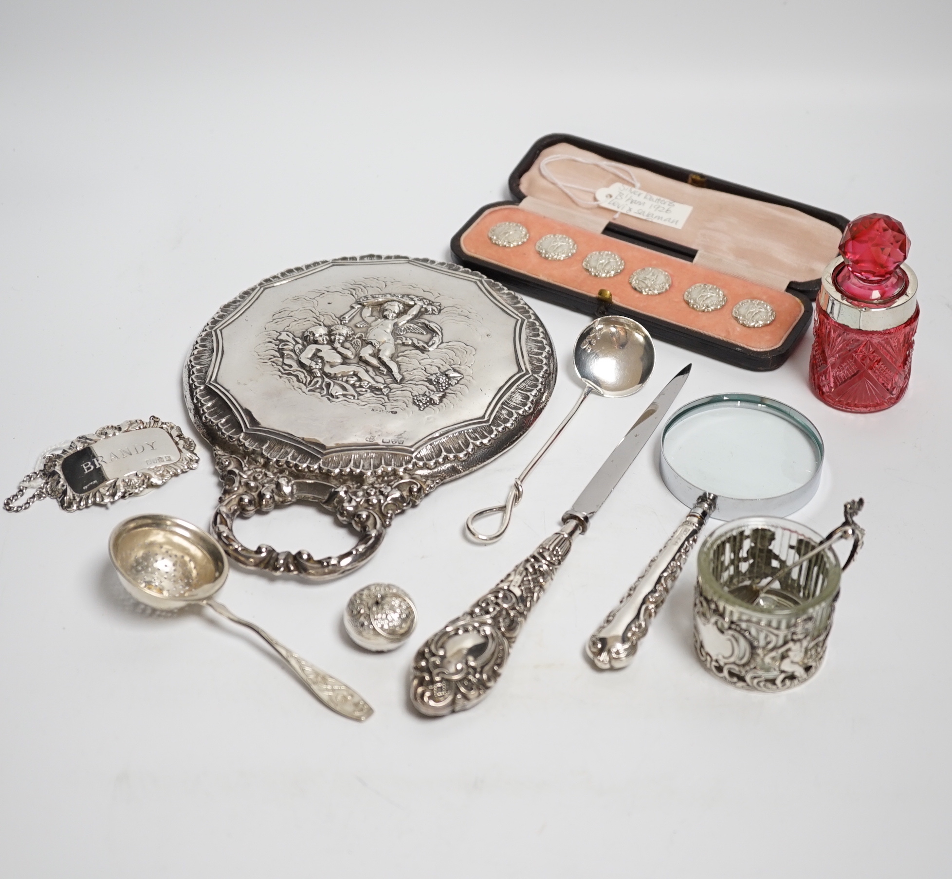 Sundry small silver including a cased set of six late Victorian silver buttons, Birmingham, 1900, a George V silver rattle bell, a silver hand mirror, wine label, scent bottle, etc.
